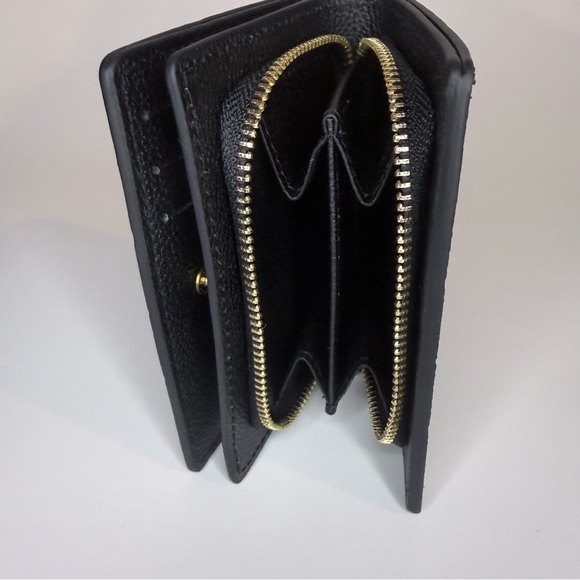 Louis Vuitton Black Embossed Monogram Wallet - Picture 4 of 7